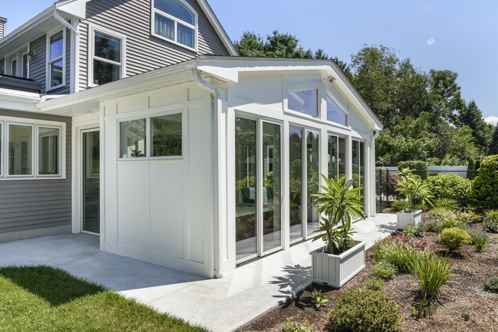 A Four-Season Sunroom Design with white exterior