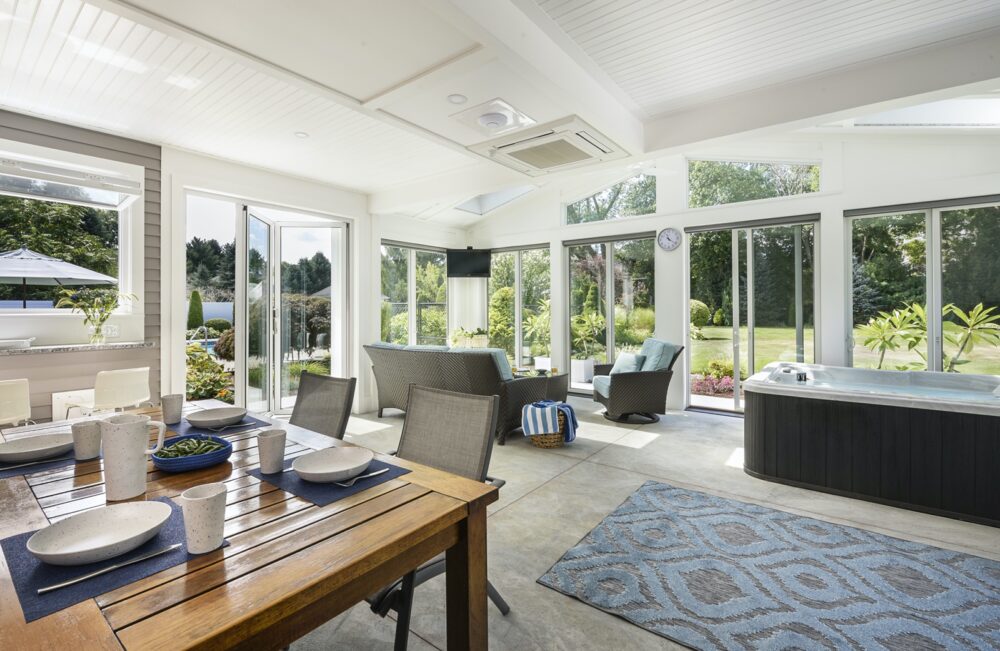 A modern contemporary Four-Season Sunroom Design by Feinmann